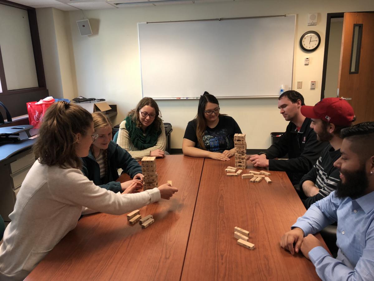 students using the Jenga game to teach resilience concepts