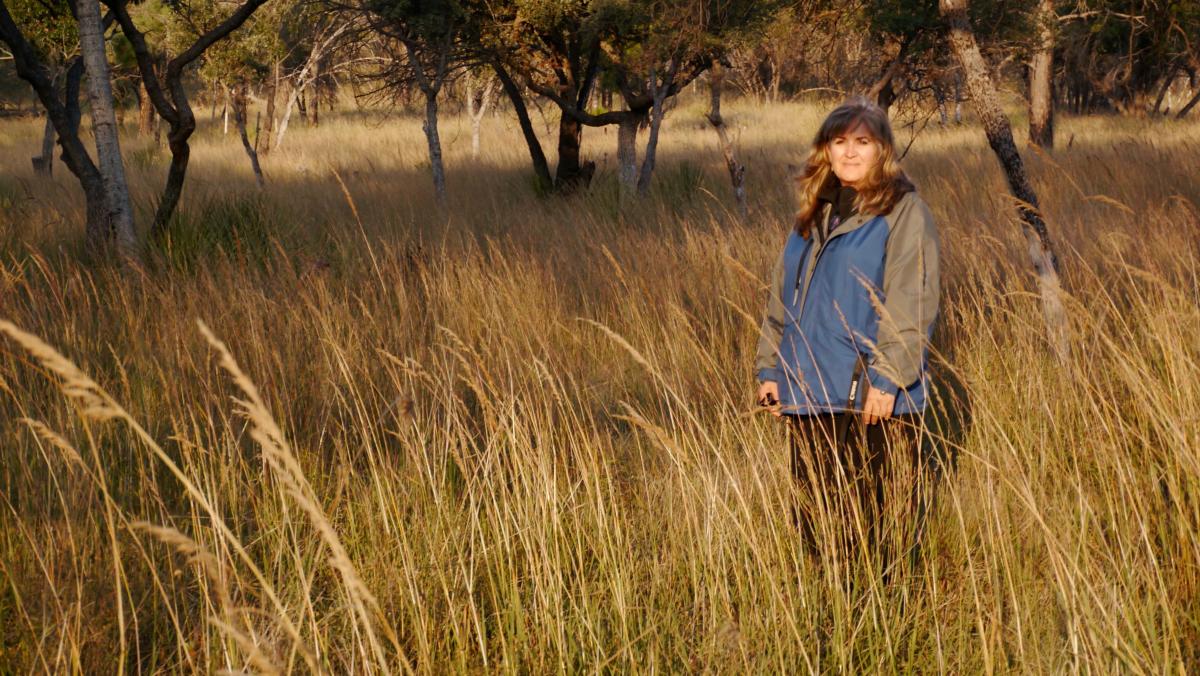 Diana Doan-Crider in grassland