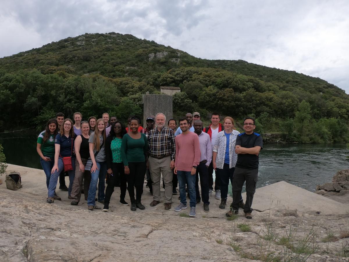 2019 tour group beside water